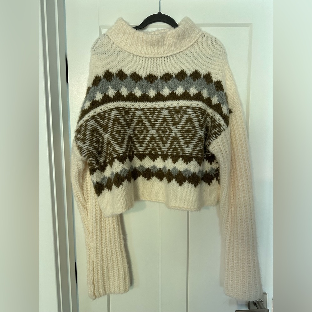 NWOT Free People cropped cozy sweater with extra long sleeves.